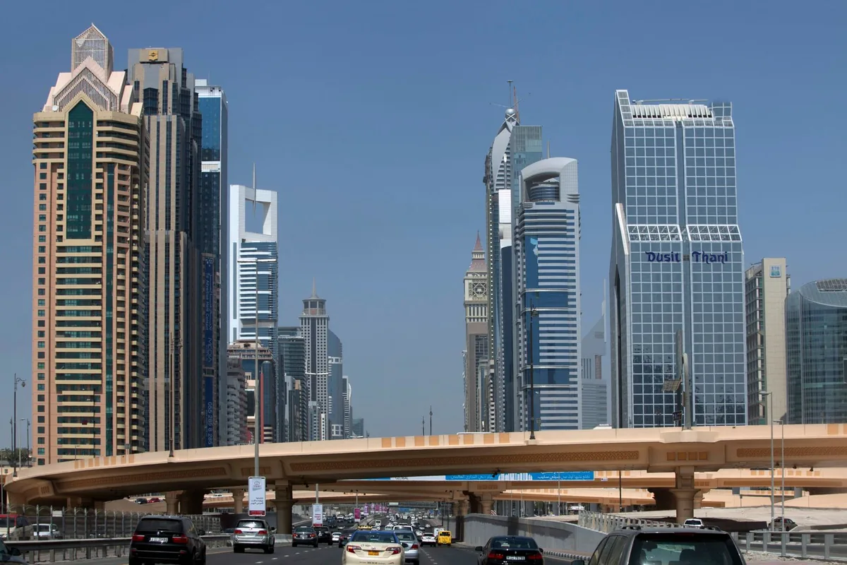 Skyscrapers lining Sheikh Zayed Road in Dubai under a clear blue sky, near our Al Mosa Tower office