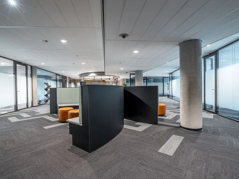Modern open-plan office interior with contemporary furniture after a commercial fit-out
